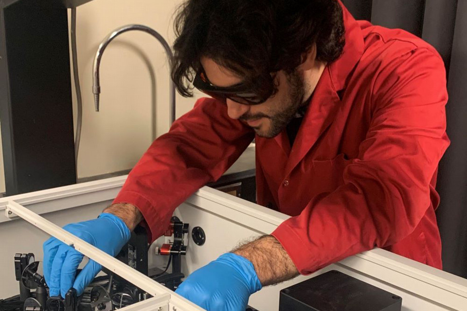 Nick Neokleous working in a lab