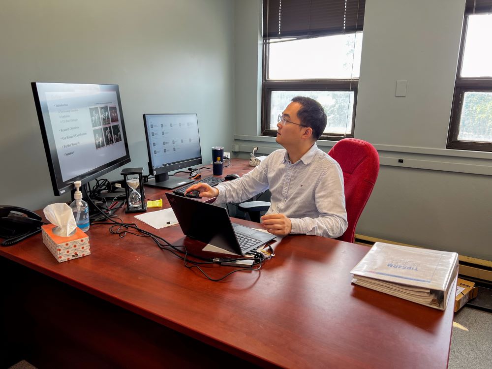 Jianbing Ni in his office