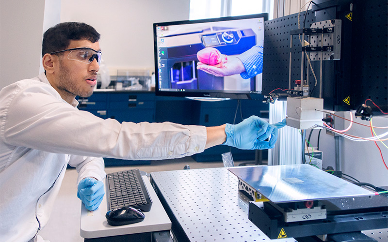 A researcher uses an emerging 3D printing process called melt electrowriting