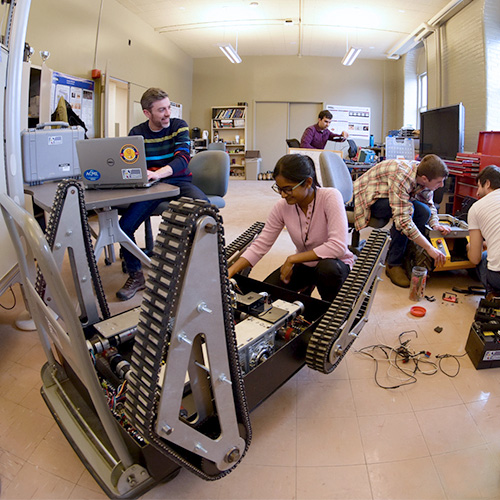 Researchers work on innovative mobile robot designs and algorithms. 
