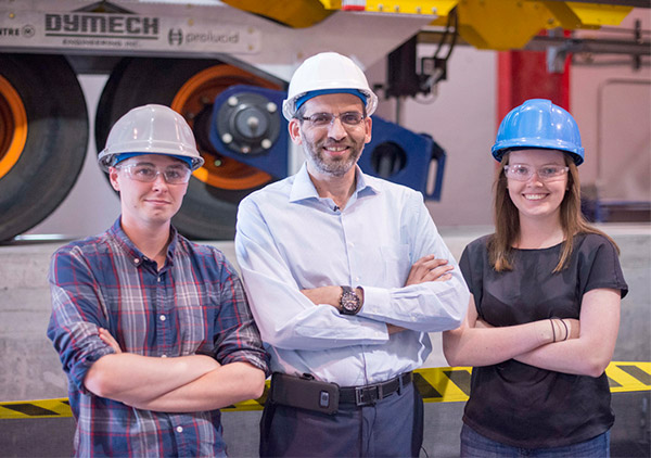 Researchers and students at the unveiling of the Rolling Load Simulator (ROLLS) 