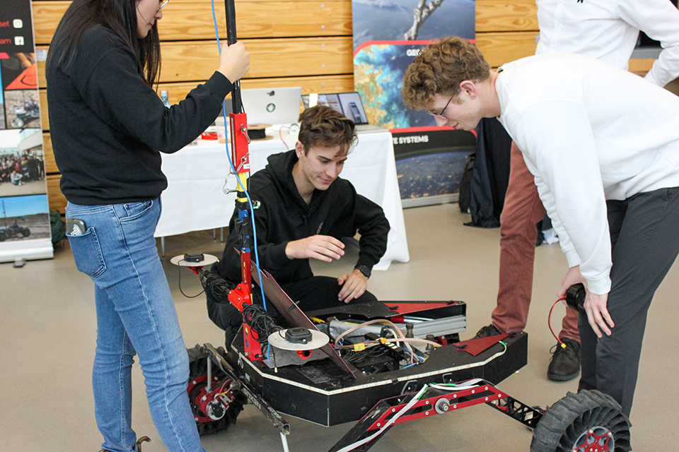 students working on a robot