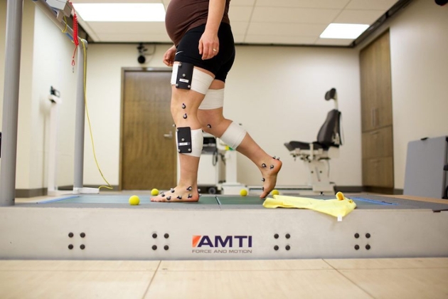 research participant on treadmill with sensors attached to them