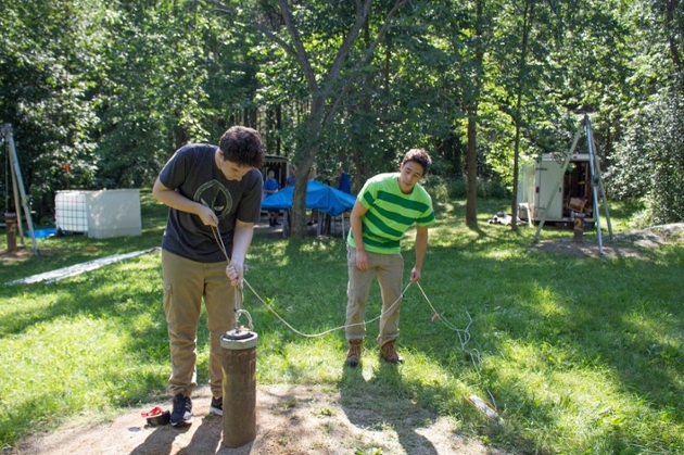 students outdoors doing field work